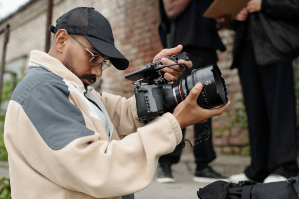 istock Filming Outdoors with a Professional Video Camera 2177626185