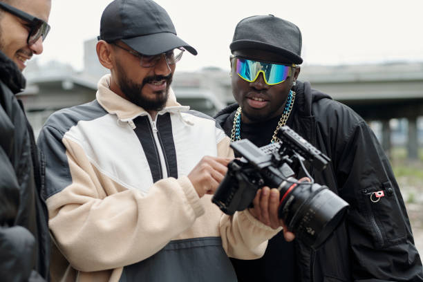 istock Filmmakers Discussing Scene With Professional Camera Equipment 2177626203