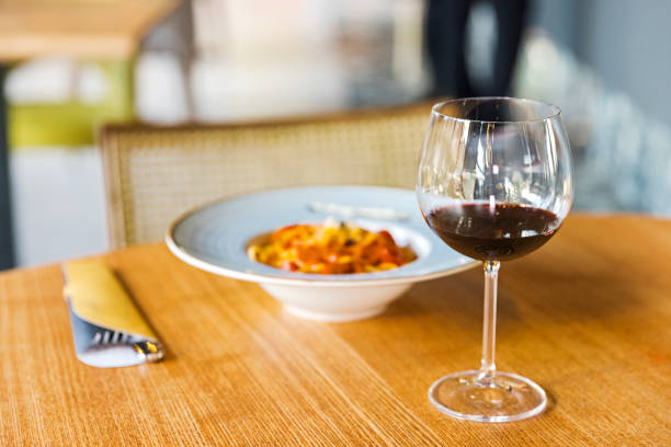 istock Elegant Dining with Red Wine and Gourmet Pasta Dish 2177627132