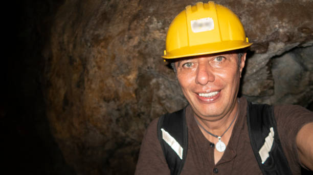Region del Maule, Chile - April 02, 2016: Miner inside the access tunnel of an underground gold and copper mine.