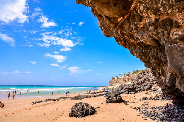 istock A beach with a large rock in the background 2177637882