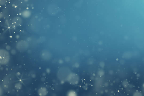 Snowfall and Christmastime lights background