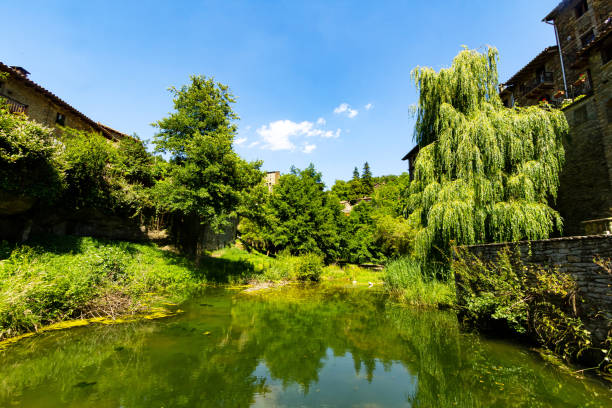 istock Lush Riverside in a Picturesque Village 2177640614