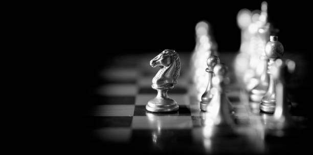 istock Pieces on chess board for playing game and strategy gaming chaos theory learning to win 2177640844