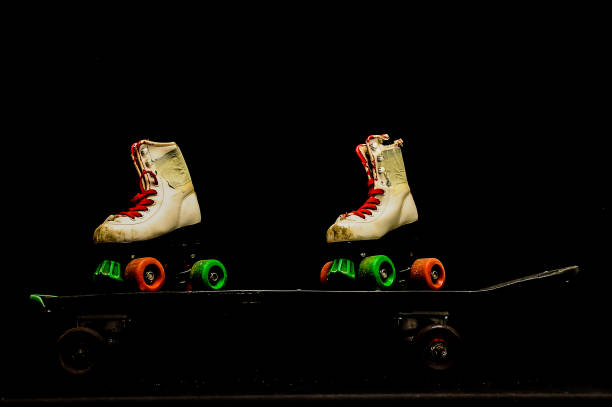 istock Two pairs of roller skates are on a skateboard 2177645667