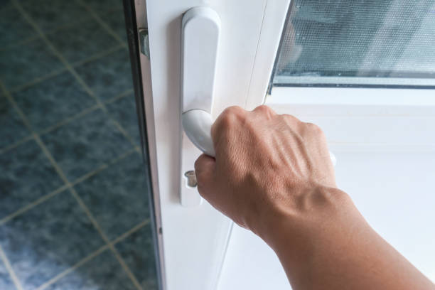 istock Hand opening a plastic pvc white door, safety and protection concept 2177645754