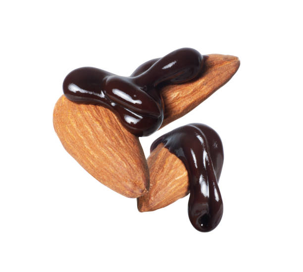 istock Almonds covered in chocolate in the air isolated on a white background 2177645804
