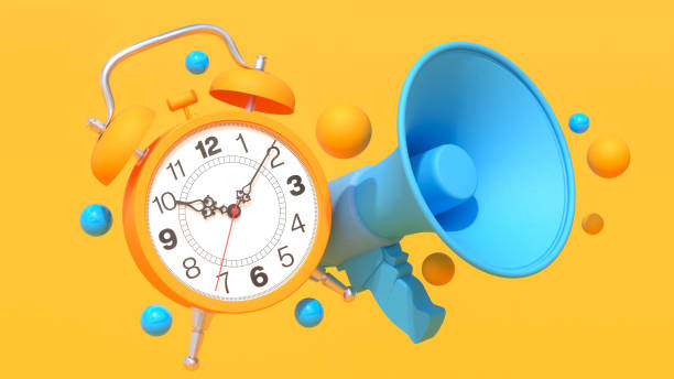 istock 3D render of a bright yellow alarm clock and blue megaphone with a 10:10 display, floating spheres, and glossy textures on a yellow background. Features blue and orange accents, geometric shapes, and a playful design. 2177646035