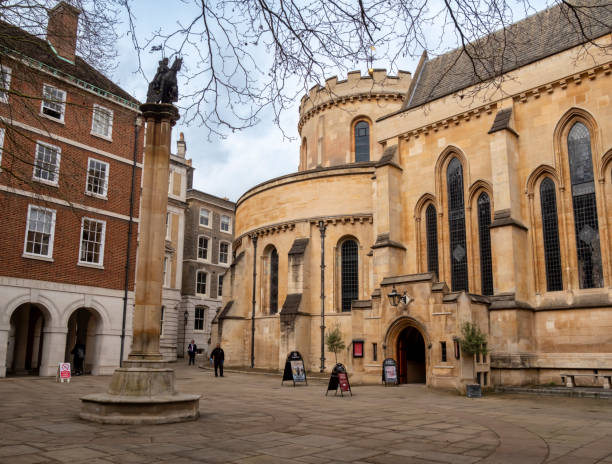 The Temple Church in Inner Temple, City of London. The Round Church was built as “London’s Jerusalem” in 1162 in honour of the round church which had been built over Christ’s grave in Jerusalem. It became the “New Temple” of the Knights’ Templar in England. In the 1840s, the church was restored and decorated in the Gothic style; it was severely damaged during the Blitz in 1941 so much more restoration had to be executed over the following years. Beside the church is a tall column with a statue of two knights on a horse; one of the explanations for this symbol of the Knights’ Templar is that of love and charity, the taking up of a wounded knight by a brother knight.