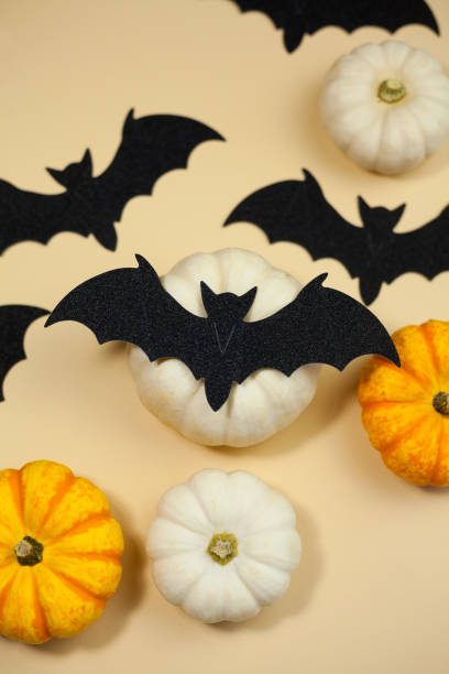 Halloween. Decor for the autumn holidays. Small pumpkins. Background.