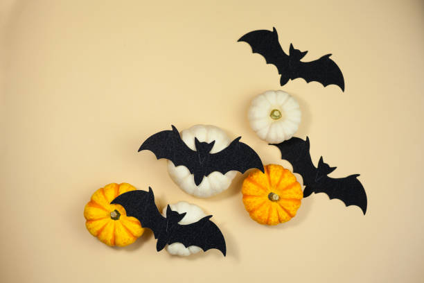 Halloween. Decor for the autumn holidays. Small pumpkins. Background.