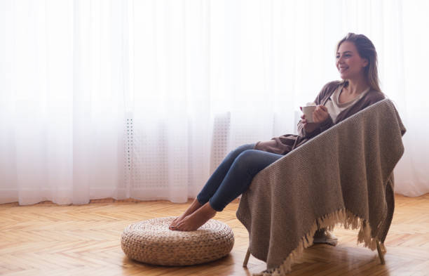 istock Relaxed woman enjoying coffee break at home 2177649355
