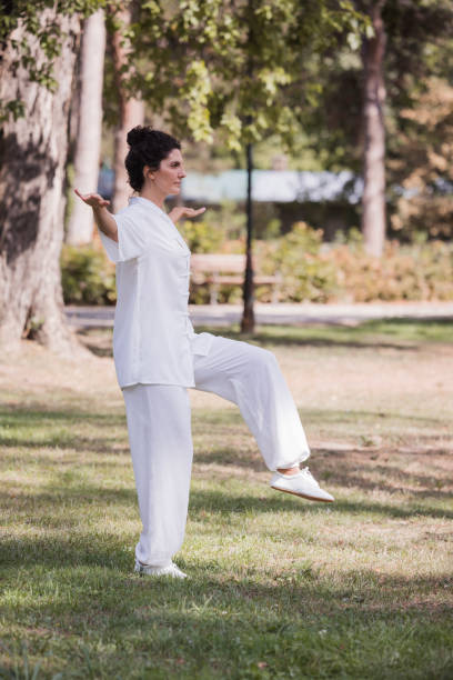 istock Women practicing Qi Gong in the nature 2177650619