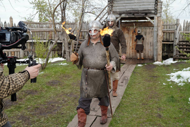 istock Filming Historical Reenactment with Actors Holding Torches 2177650648