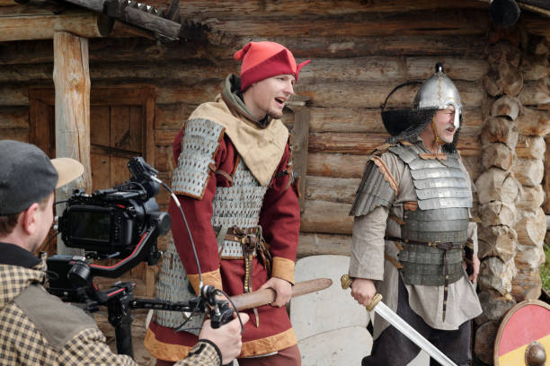 istock Filming Reenactment Scene with Medieval Costumes and Armors 2177650653