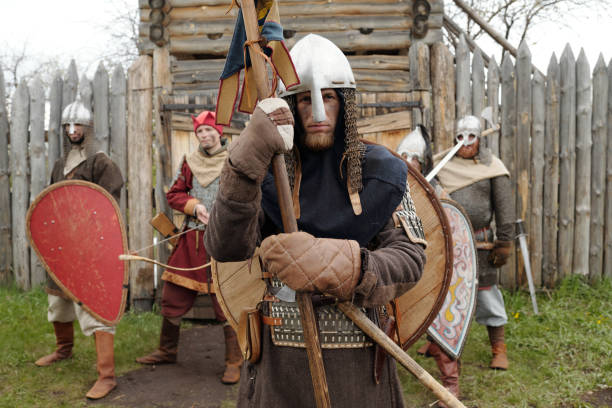 istock Medieval Warriors Guarding Fort Entrance in Armor and Helmets 2177650712