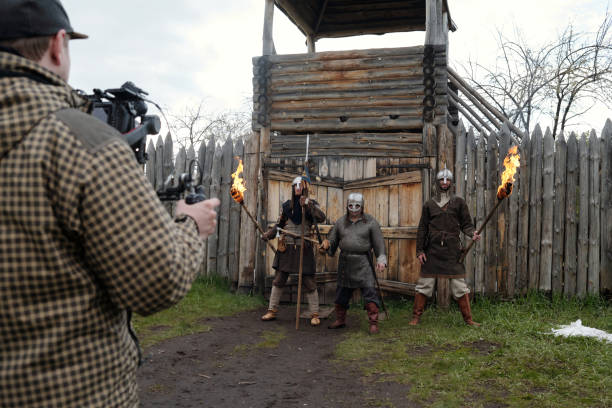 istock Filming Medieval Warriors at Wooden Fort with Torches 2177650741