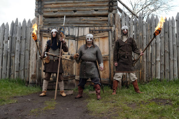 istock Reenacting Medieval Knights with Flaming Torches Outside Fort 2177650748