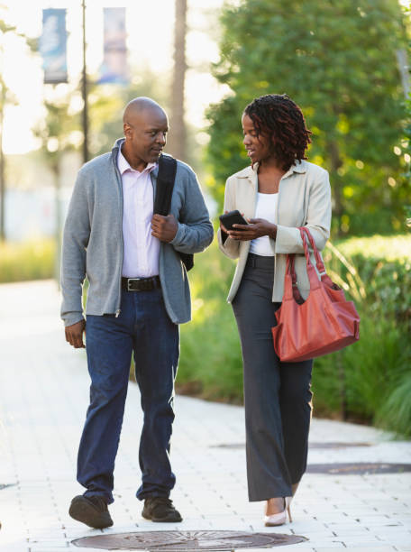 istock African-American couple walking to work 2177651008