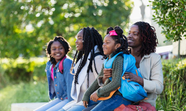 istock African-American mother, three daughters after school 2177651053