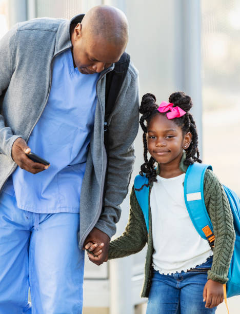 istock Healthcare worker taking daughter to school 2177651076