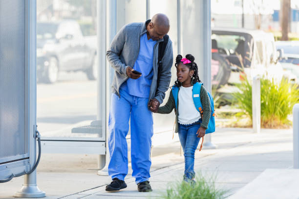 istock Healthcare worker taking daughter to school 2177651077