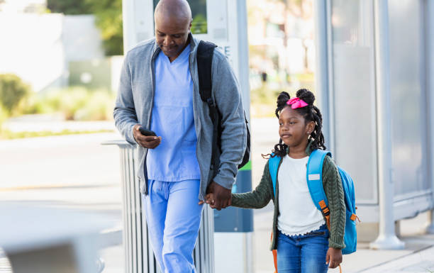 istock Healthcare worker taking daughter to school 2177651081