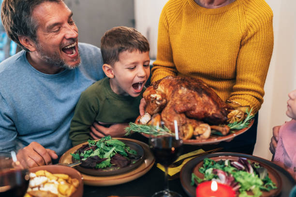 istock Family enjoy Thanksgiving lunch together 2177653749