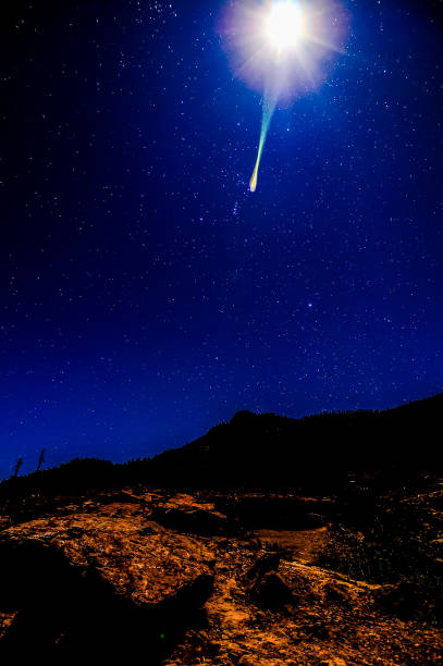 istock A bright star is shining in the sky above a mountain 2177655081