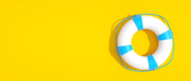 istock Life Ring on Bright Yellow Background Symbolizing Safety and Summer Fun – 3D Rendering 2177656143