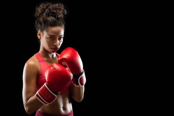 istock Strong black woman in red boxing gloves 2177656611