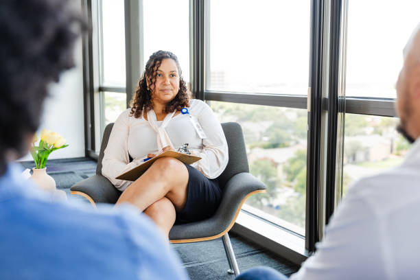 istock Serious female counselor listens to unrecognizable couple 2177657238