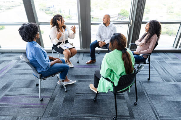 istock High angle view multiracial group of people in meeting 2177657283