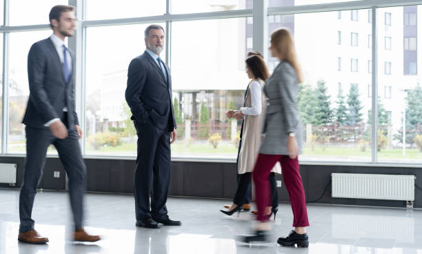 istock Business people at work in a busy office space. 2177657455