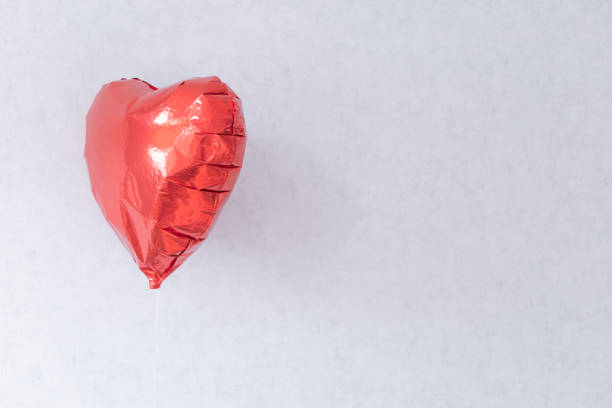 istock balloon red heart on a rope 2177660818