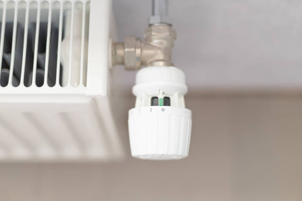 istock battery heating knob, heating in an apartment, home. Heating prices. 2177660819