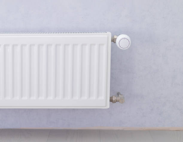 istock battery heating knob, heating in an apartment, home. Heating prices. 2177660843