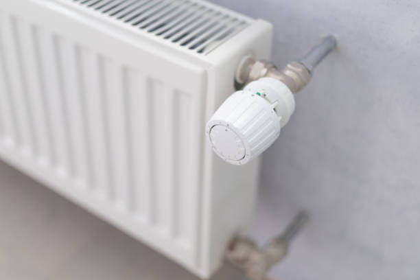 istock battery heating knob, heating in an apartment, home. Heating prices. 2177660851