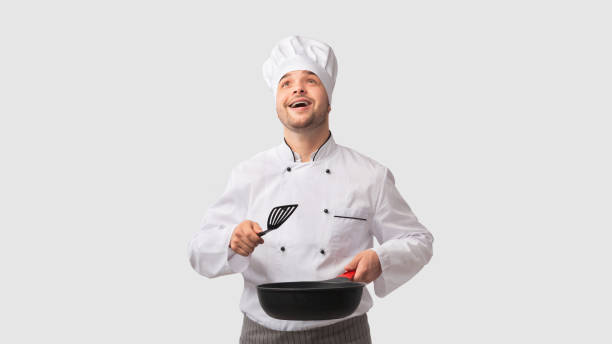 istock Cook Man Holding Pan And Spatula Looking Up, White Background 2177661007