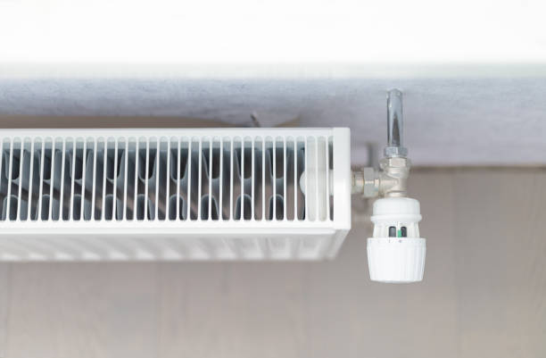 istock battery heating knob, heating in an apartment, home. Heating prices 2177661230