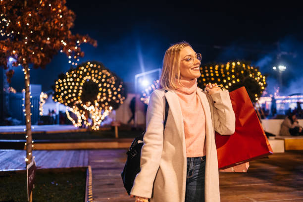 istock Woman with shopping bags 2177661458