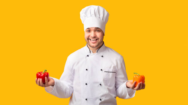 istock Chef Man Holding Sweet Peppers Posing, Studio Shot, Panorama 2177661563
