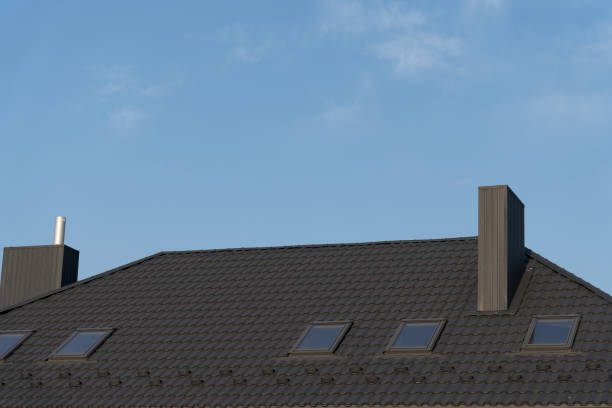 istock A sleek rooftop adorned with skylights reaches towards a bright blue sky. The minimalistic design contrasts beautifully with the tranquil atmosphere of a sunny day 2177662143