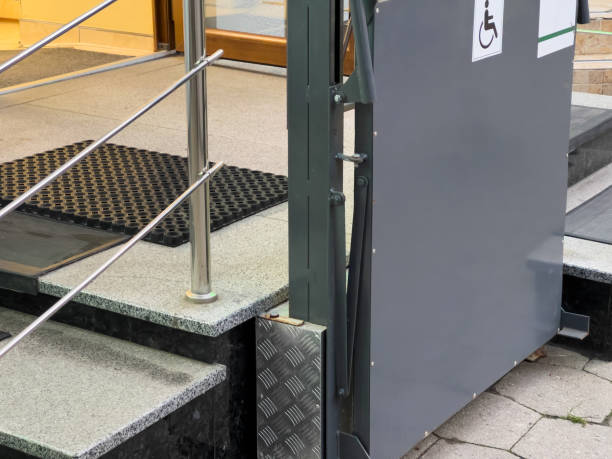 istock A sleek, metallic ramp stands ready by a set of stairs, designed for those with mobility impairments, promoting inclusivity and accessibility for all 2177662172
