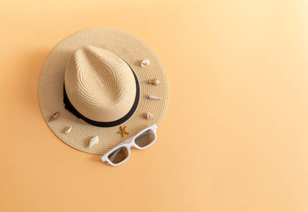 istock flat lay with straw hat, dark glasses and seashells, sea vacation concept 2177662407