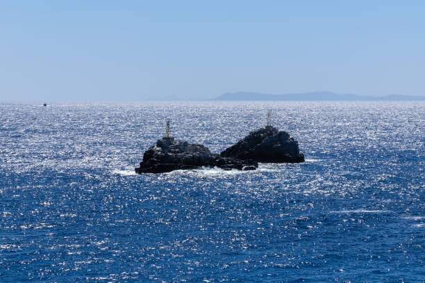 View of sea buoys on small rocks for navigational aid in the Aegean sea