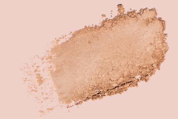 istock Eye shadow palette texture swipe isolated on pastel background. Cosmetic product swatch. Make up mate nude shades. 2177667277