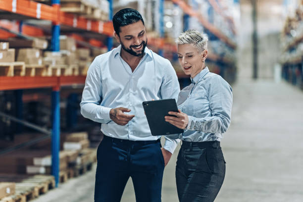 istock Warehouse supervisor talking with business manager 2177668223