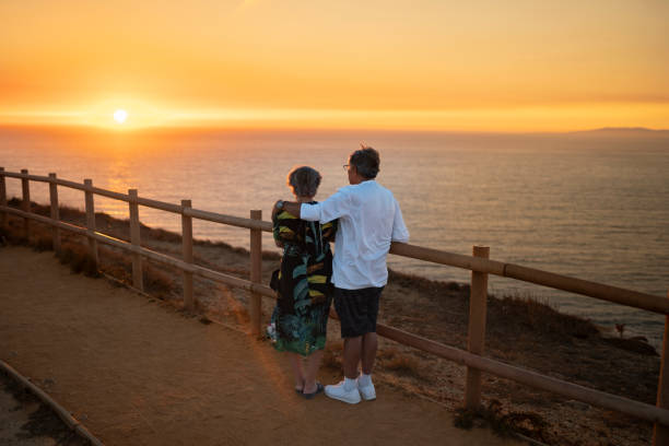 istock Elderly couple watching the sunset at Cabo Espichel 2177671332