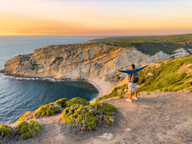 istock Man with open arms at sunset at Cabo Espichel 2177671361